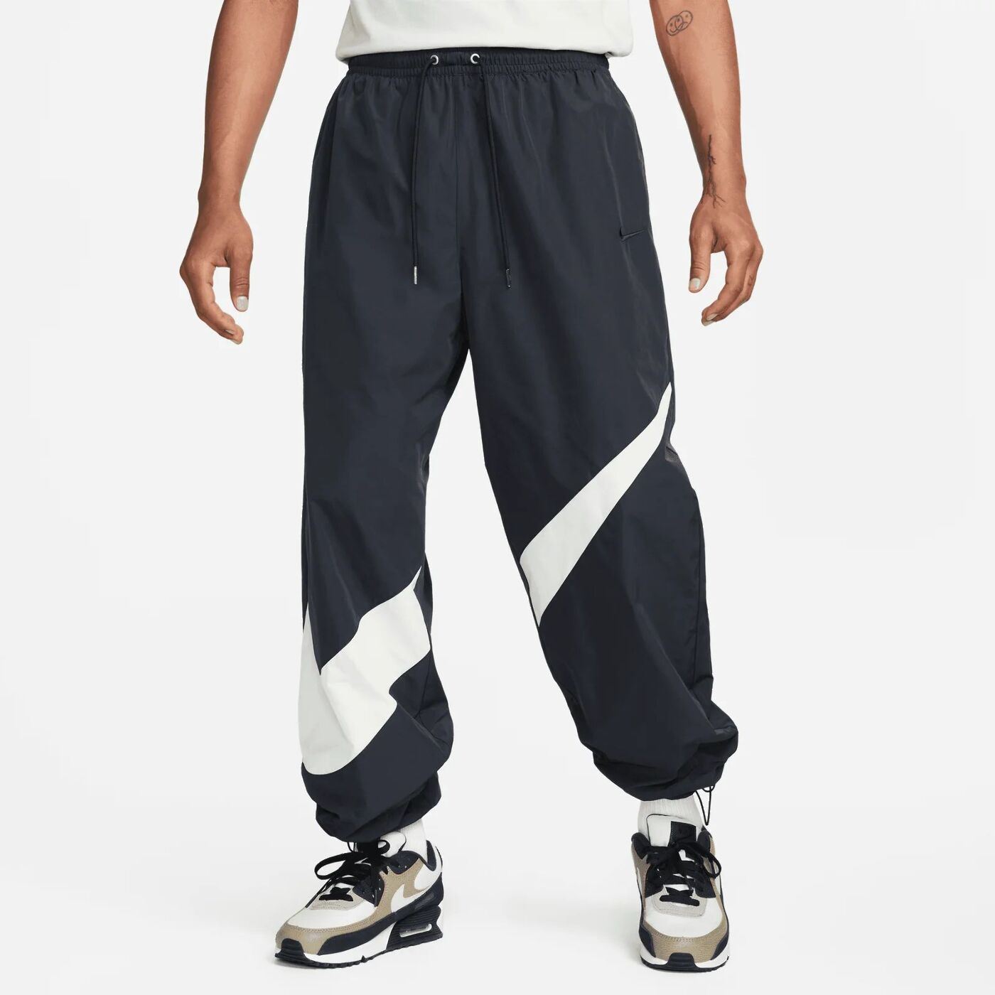 Спортивні штани Nike Swoosh Pant FB7880-010