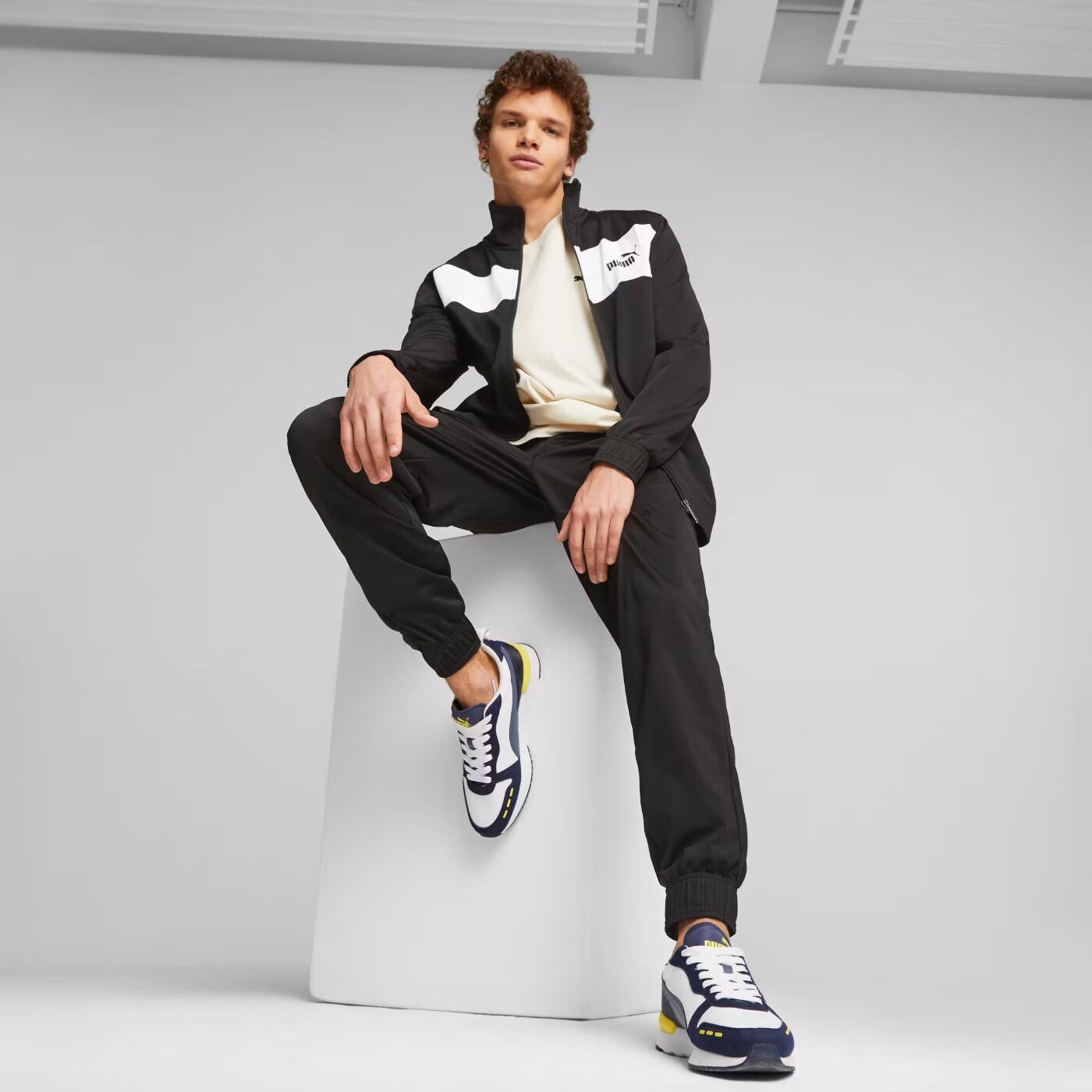 Спортивний костюм Puma Poly Suit CL 67742701